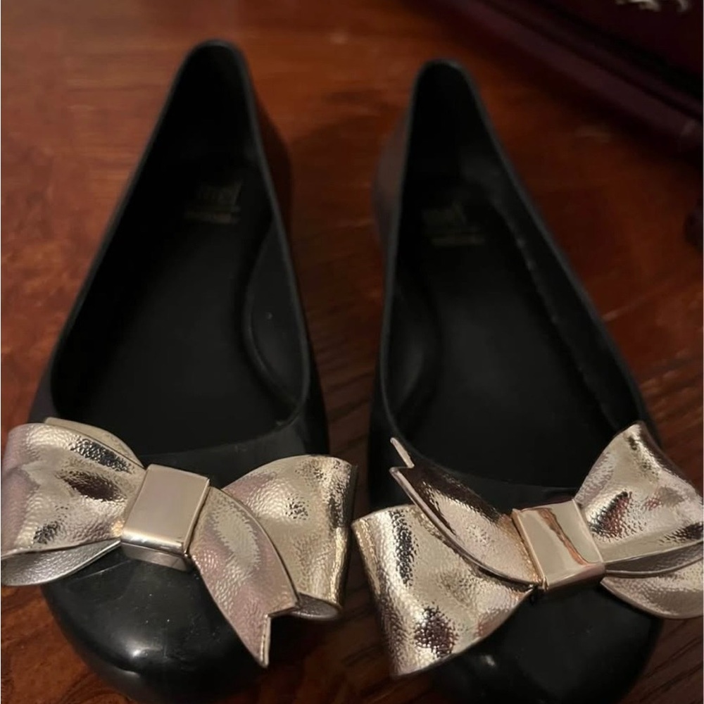 Melissa Black Flats with Metallic Gold Bow